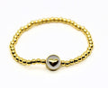 Single - White Heart Gold Beaded Bracelet