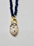 Vintage sterling heart lock on navy beaded necklace