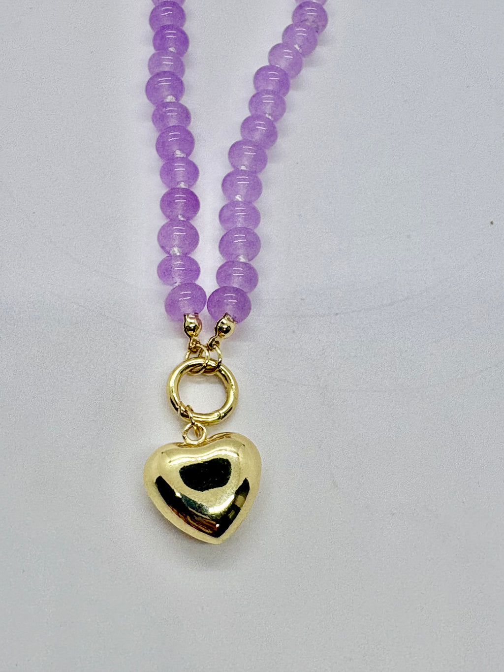 Beaded necklace with gold heart