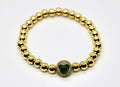 Encapsulated Heart Gold Beaded Bracelet