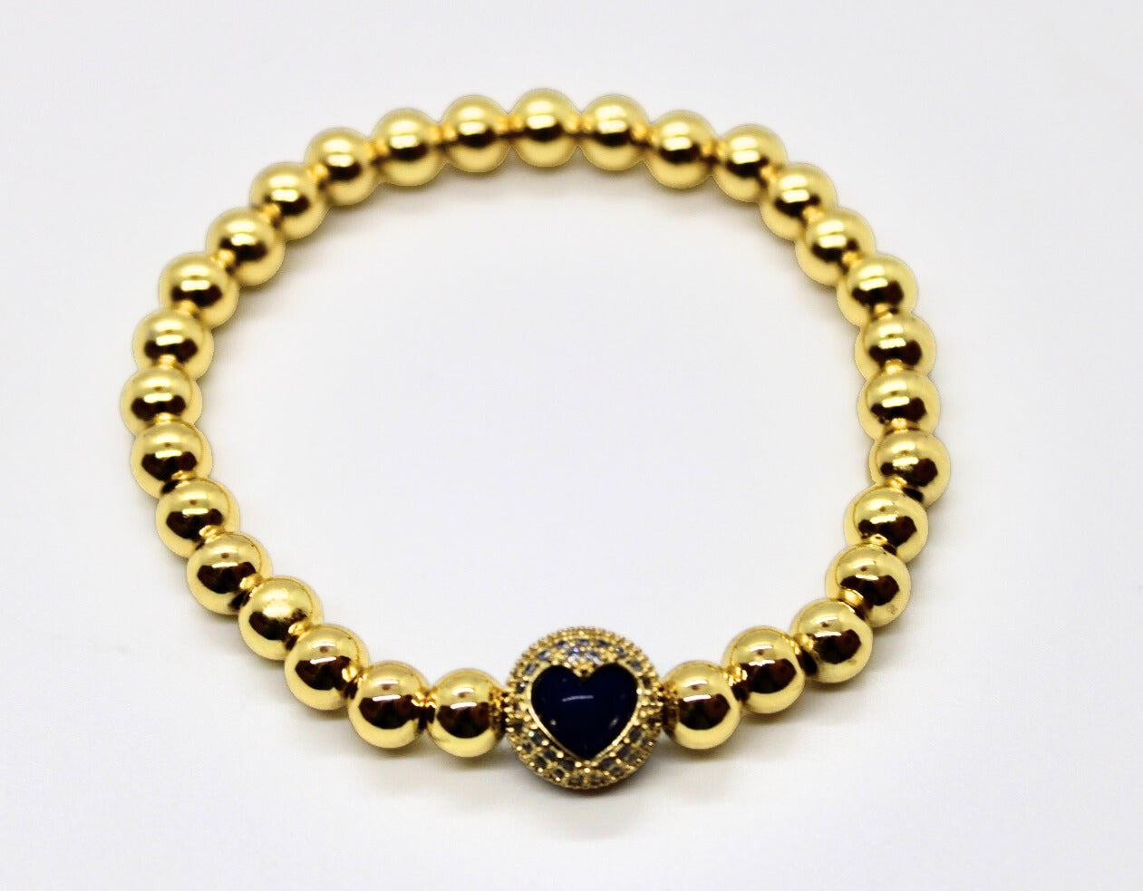 Encapsulated Heart Gold Beaded Bracelet